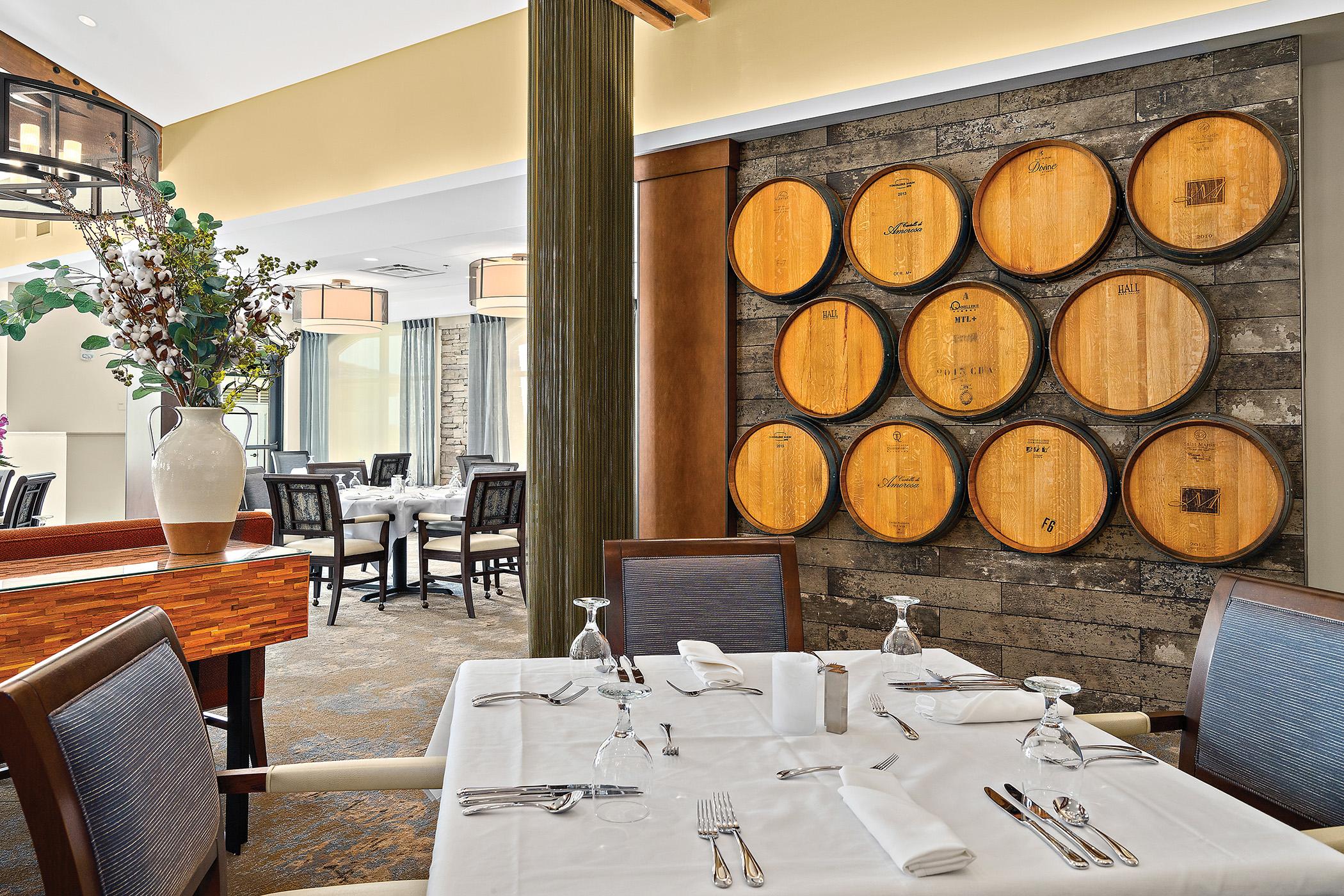 Meadows of Napa Valley dining room with a view of wine barrels